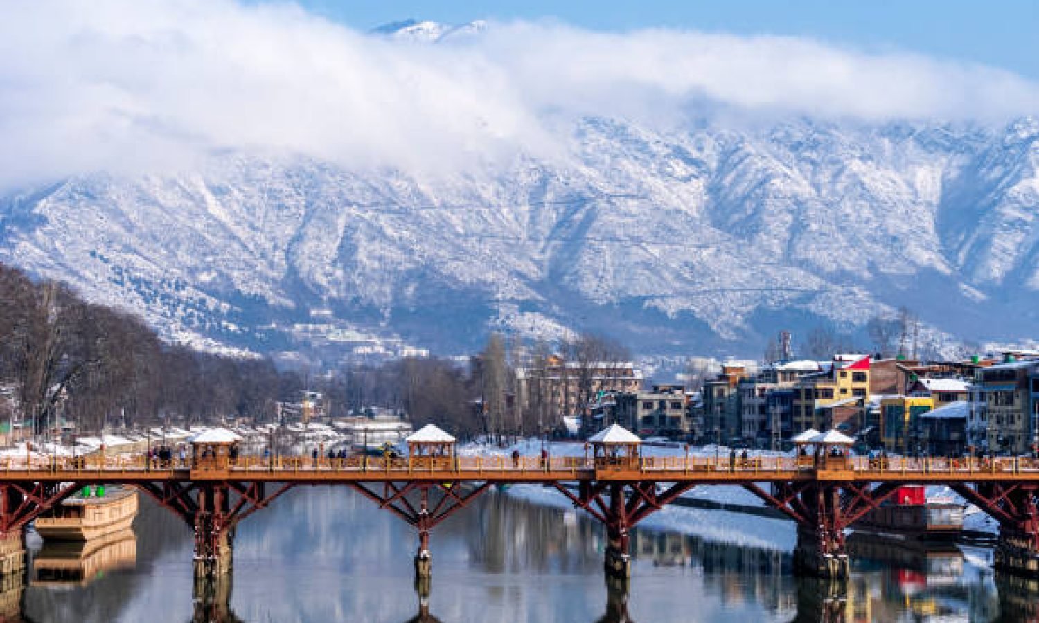 Beautiful scenery of Zero bridge with Himalaya mountain covered with snow in the background.